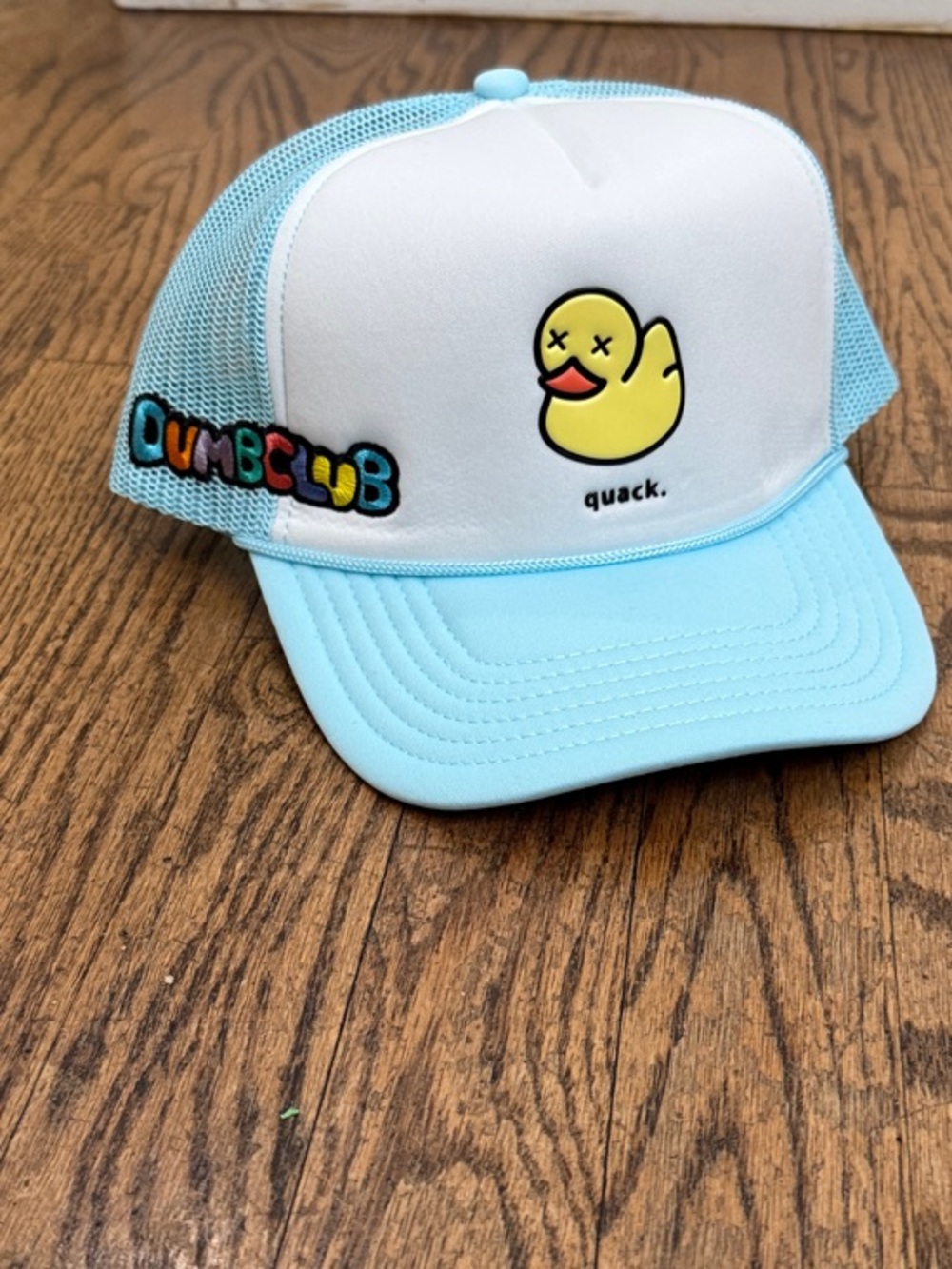 Light Blue and White Dumbclub Trucker Hat